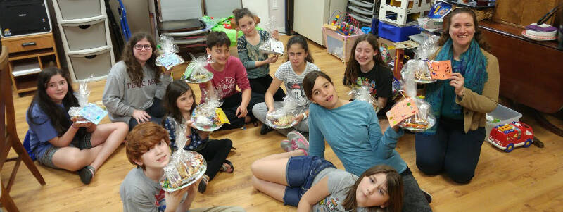 		                                		                                    <a href="https://www.shir-ami.com/religious-school.html"
		                                    	target="_blank">
		                                		                                <span class="slider_title">
		                                    Register for our Religious School - Click for more information!		                                </span>
		                                		                                </a>
		                                		                                
		                                		                            	                            	
		                            <span class="slider_description">Celebrating Purim with the Mishloach Manot made during our Hammentashen Baking Party</span>
		                            		                            		                            